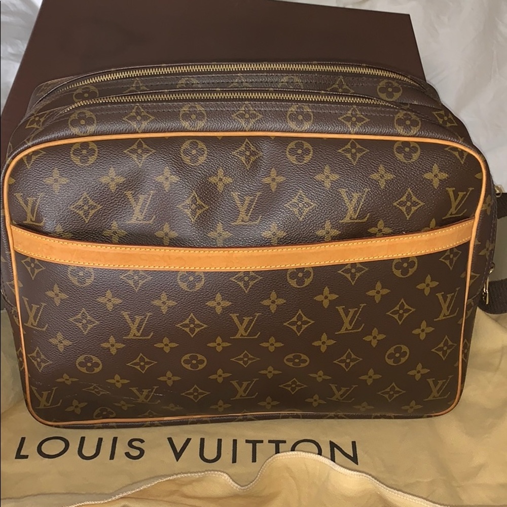 Louis Vuitton cross body travel bag